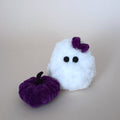 White handmade ghost with a purple bow and matching purple pumpkin, a tiny cozy Halloween decor set